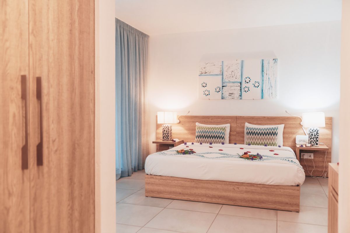 Casuarina hotel & spa privilege Room bedroom and wardrobe
